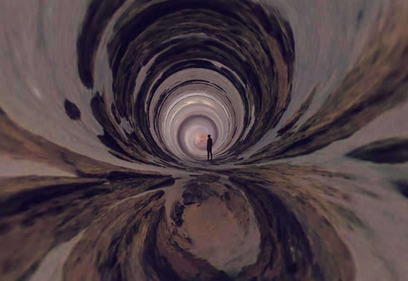 NFT art of person standing in swirling tunnel