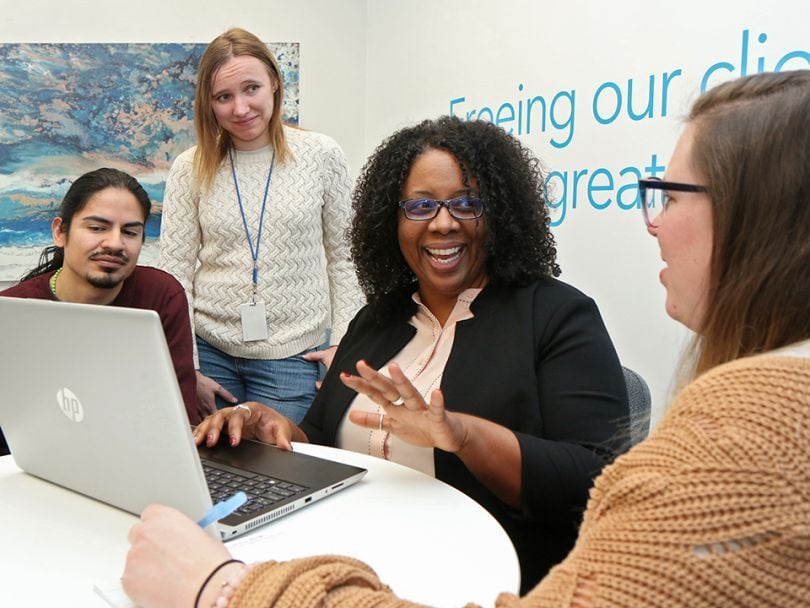 Erika Robinson with coworkers