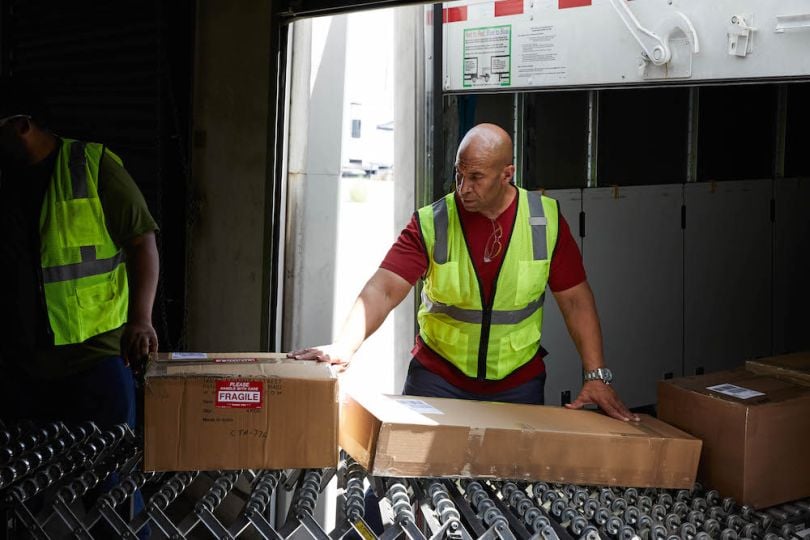 Warehouse workers loading cargo