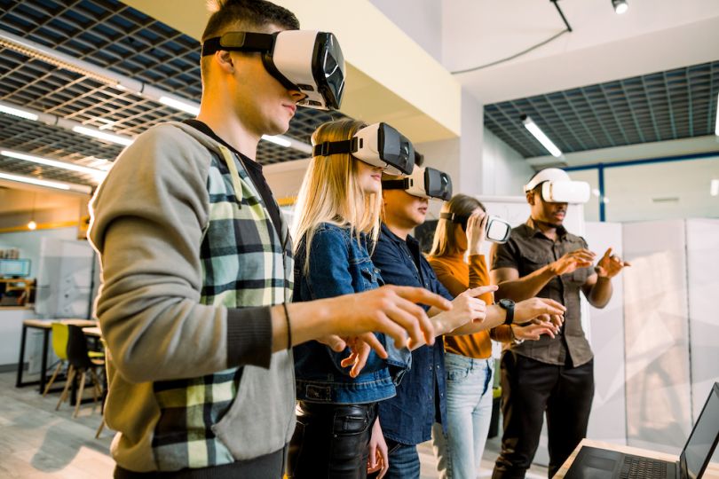 A group of people in VR headsets