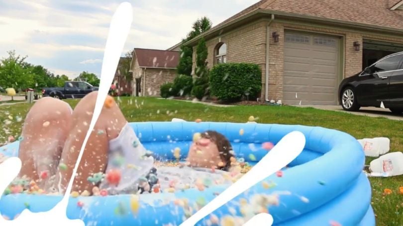 boy jump in milk and cereal pool