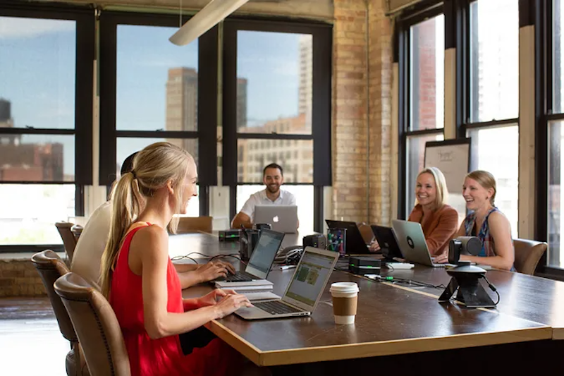 Nordstrom staff members in a team meeting