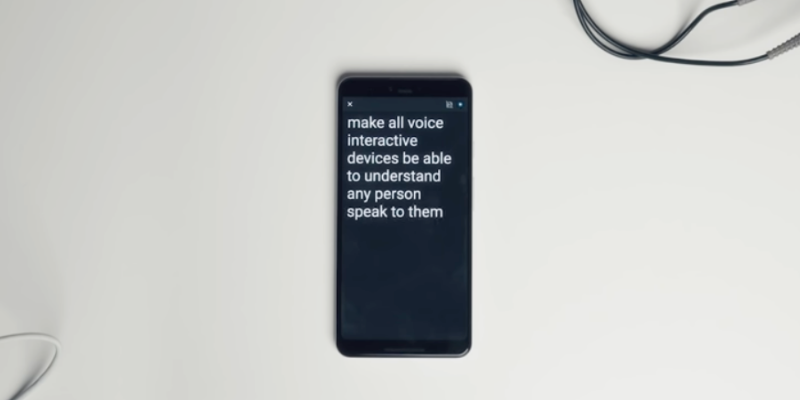 A mobile device transcribing speech into text.