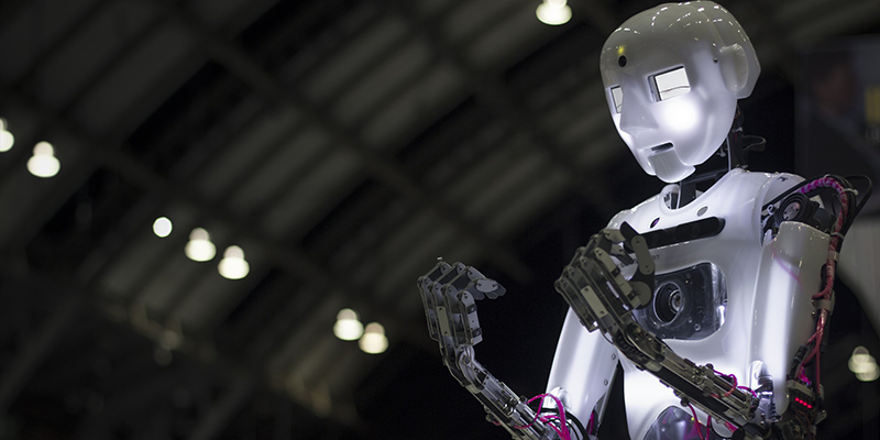 AI-powered humanoid robots field questions from reporters