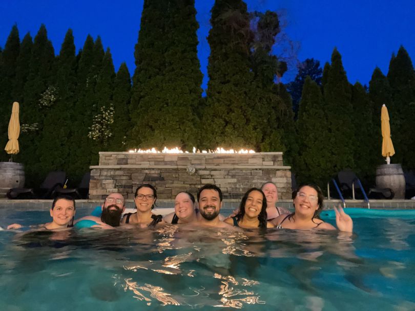 Roofr employees taking a swim during the company’s summer off-site gathering. 