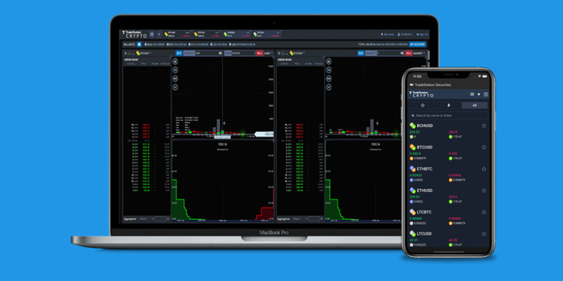 The Tradestation crypto app displayed on a mobile device and laptop computer showing crypto trends and trading activity.