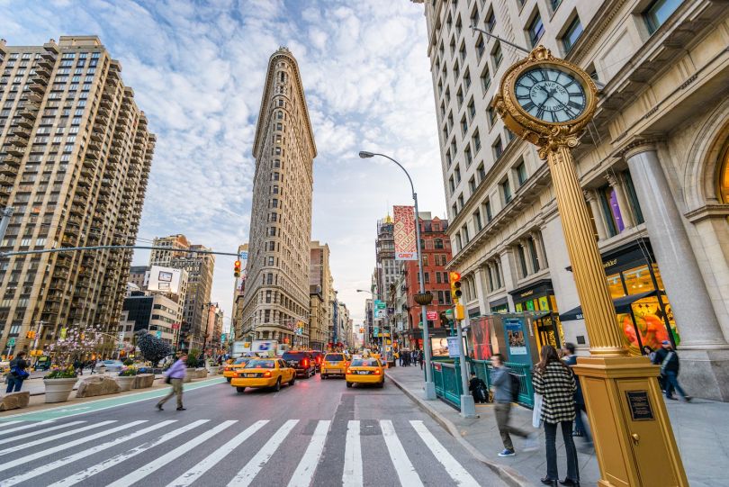 A view of the Flatiron Building from Fifth Avenue in New York City.