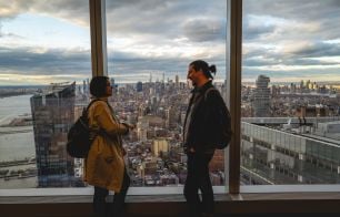 Our employees chatting whilst enjoying the NYC views.