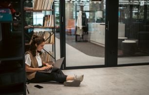 A Celonis Employee hard at work on their laptop in Madrid.