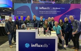 Male and female InfluxData employees at our AWS re:Invent booth