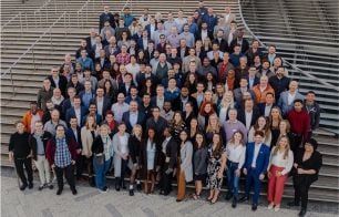 Group picture from the 2023 Analytics8 Leadership Summit, showcasing team members gathered together smiling.