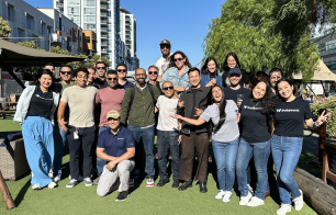 Group photo of Instawork employees outside during a summer event