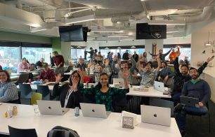 Employees gathered in office for All-hands meeting