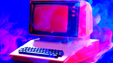 A retro computer surrounded by vapor.